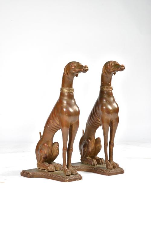 A PAIR OF GILT PAINTED SOFTWOOD SEATED GREYHOUNDS (2)