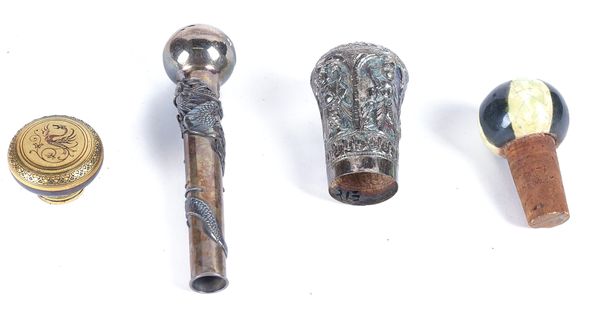 A GILT-METAL INLAID TOLEDO-WARE FINIAL TOGETHER WITH A CHINESE SILVER DRAGON  WALKING CANE OR PARASOL HANDLE (4)