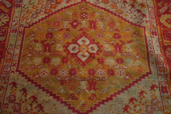 A USHAK RUG AND A BESHIR RUG (2)