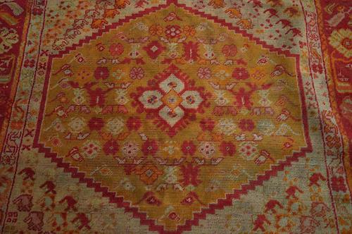 A USHAK RUG AND A BESHIR RUG (2)