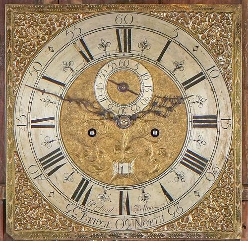 A GEORGE III AND LATER PARCEL-GILT GREEN JAPANNED LONG CASE CLOCK