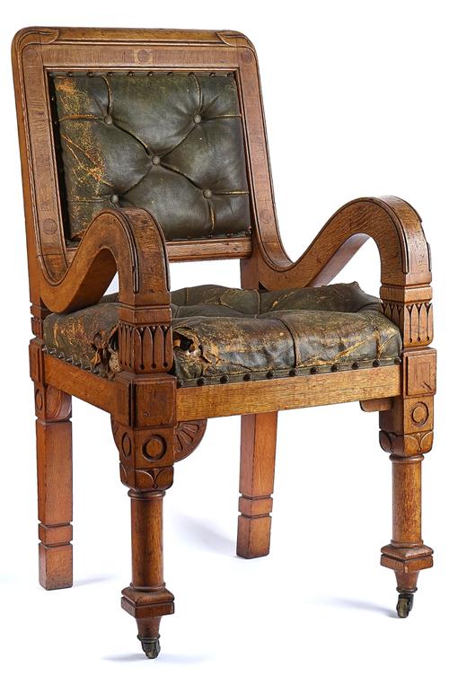 A VICTORIAN OAK FRAMED OPEN ARMCHAIR