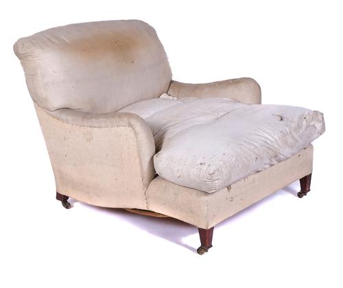 A HOWARD & SONS DEEP SEAT EASY ARMCHAIR