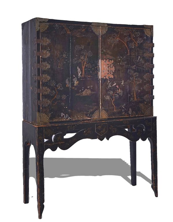 A 18TH-CENTURY CHINESE METAL-MOUNTED MOTHER-OF-PEARL INLAID LACQUERED TWO DOOR CABINET