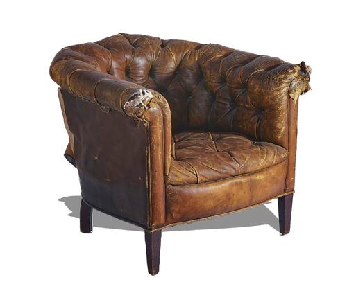 MAPLES & CO.; AN EDWARDIAN GREEN LEATHER UPHOLSTERED TUB BACK EASY ARMCHAIR
