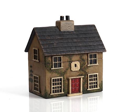 A FOLK ART PAINTED NOVELTY COTTAGE TEA-CADDY