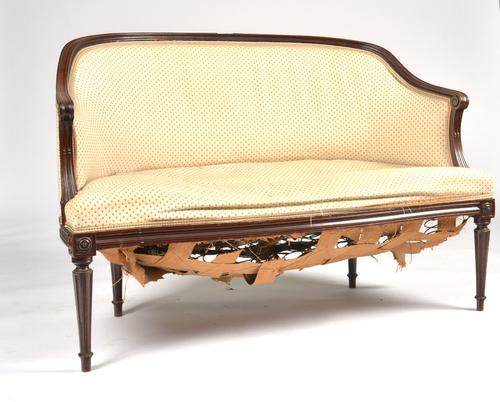 A SMALL 19TH CENTURY MAHOGANY FRAMED TUB BACK SOFA