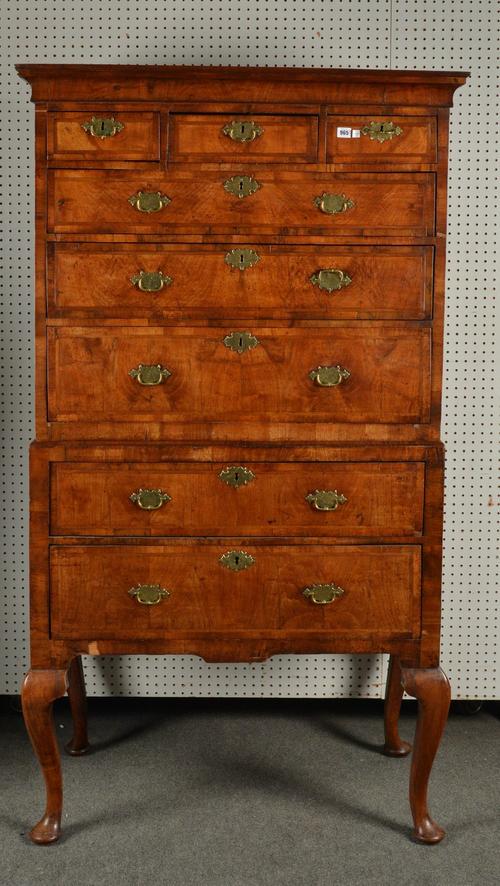A GEORGE I WALNUT AND OAK HIGHBOY