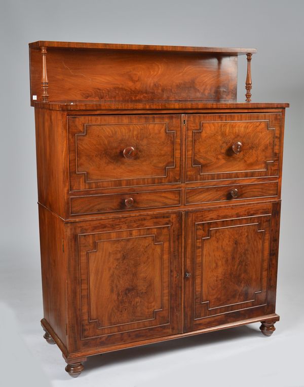 A GEORGE III MAHOGANY SHELF BACK SECRETAIRE CABINET