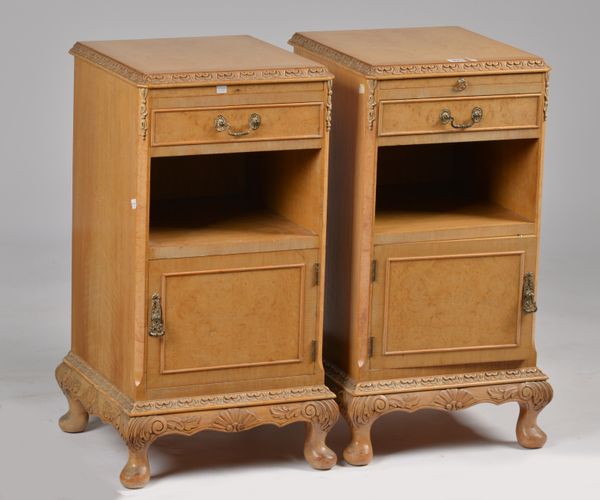 A PAIR OF MID-20TH CENTURY BLEACHED WALNUT BEDSIDE TABLES (2)