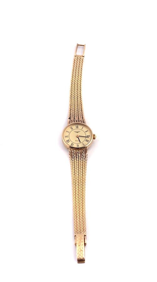 A LONGINES QUARTZ 9CT GOLD LADY'S BRACELET WRISTWATCH