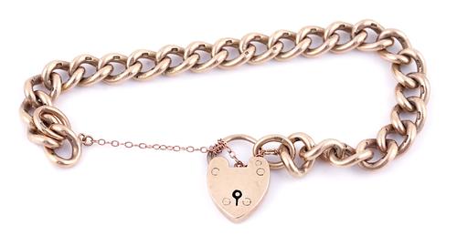A 9CT GOLD SOLID CURB LINK BRACELET