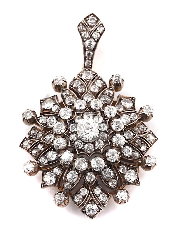 A LATE 19TH CENTURY DIAMOND SET PENDANT OF FLOWERHEAD STARBURST DESIGN