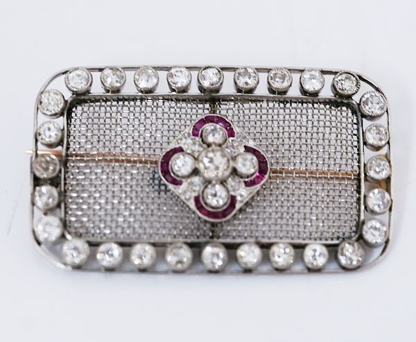 A DIAMOND AND RUBY BROOCH