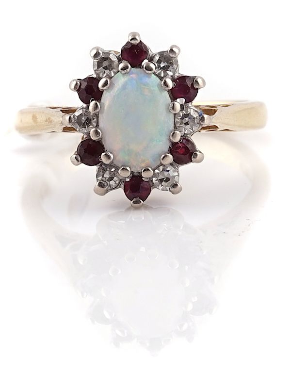 AN 18CT GOLD, OPAL, RUBY AND DIAMOND OVAL CLUSTER RING