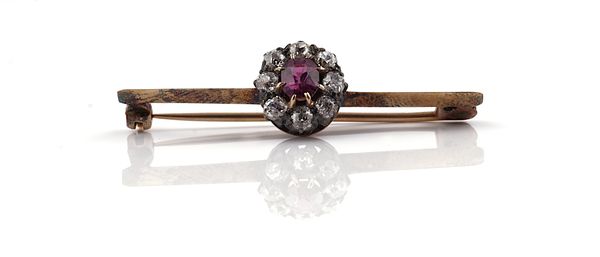 A RUBY AND DIAMOND CLUSTER BAR BROOCH