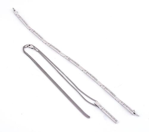 A 9CT WHITE GOLD AND DIAMOND BRACELET WITH A MATCHING PENDANT AND NECKCHAIN (3)