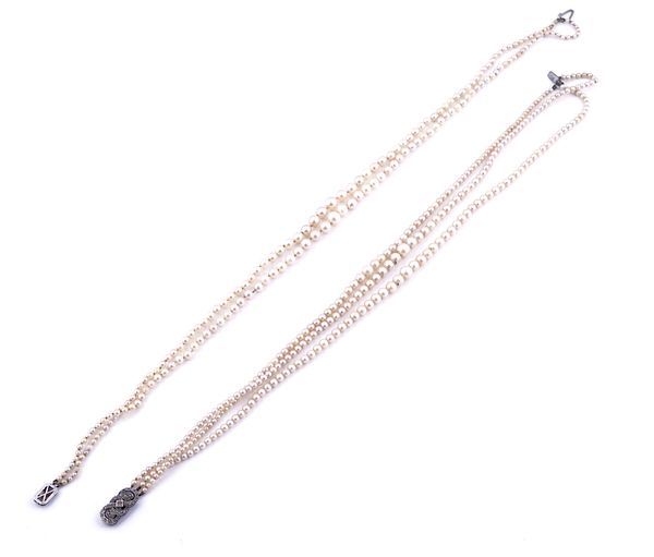 A TWO ROW CULTURED PEARL NECKLACE AND A THREE ROW CULTURED PEARL NECKLACE (2)