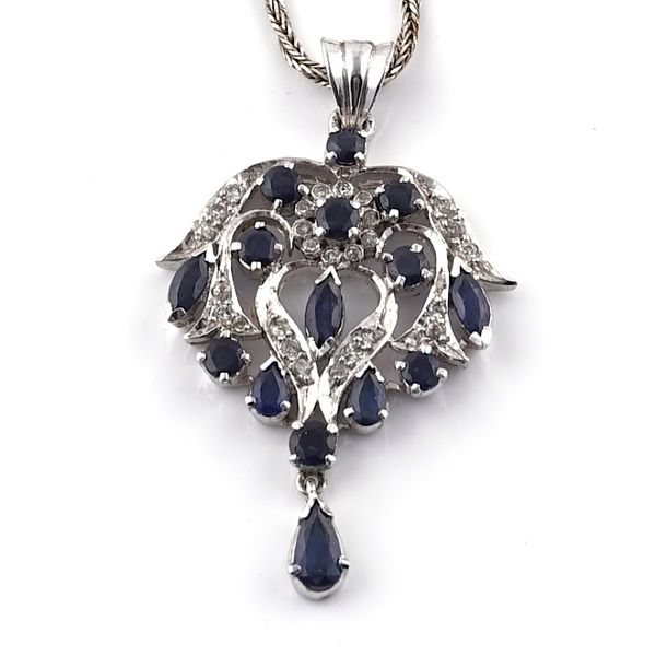 A SAPPHIRE AND DIAMOND PENDANT, WITH A NECKCHAIN