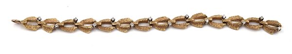 A GOLD AND DIAMOND BRACELET