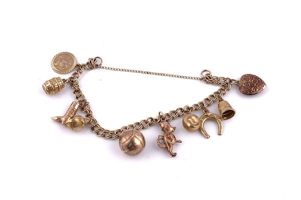 A GOLD TWIN CURB LINK CHARM BRACELET