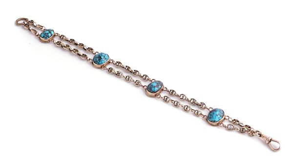 A GOLD AND TURQUOISE BRACELET