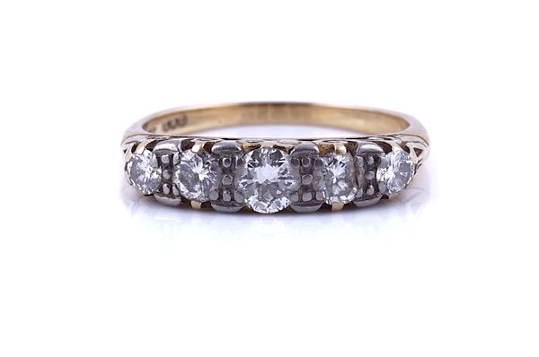 A GOLD AND DIAMOND FIVE STONE RING