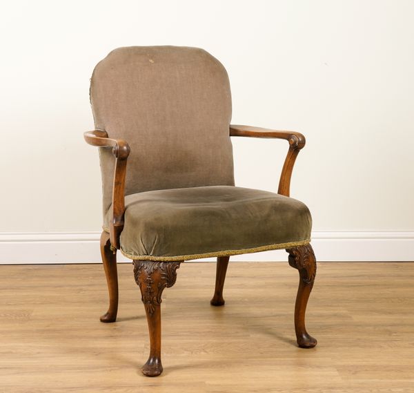 A GEORGE III STYLE MAHOGANY FRAMED OPEN ARMCHAIR ON CARVED CABRIOLE SUPPORTS