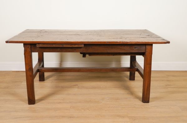 A 19TH CENTURY FRENCH FRUITWOOD CLEATED PLANK TOP KITCHEN TABLE ON CANTED SQUARE SUPPORTS