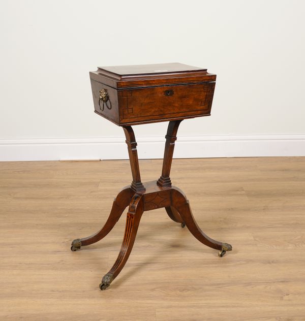 A REGENCY INLAID MAHOGANY TEAPOY WITH FOUR CADDY INTERIOR