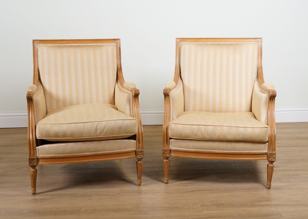 A PAIR OF LOUIS XVI STYLE SQUARE BACK EASY ARMCHAIRS (2)