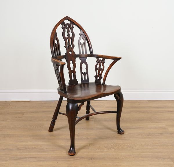 A 19TH CENTURY ASH ELM AND FRUITWOOD GOTHIC REVIVAL WINDSOR CHAIR