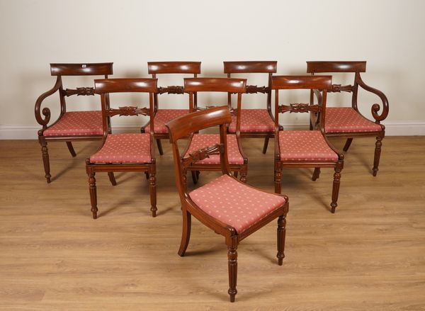 A SET OF EIGHT GEORGE IV MAHOGANY FRAMED DINING CHAIRS ON REEDED SUPPORTS (8)