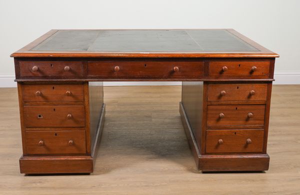 A 19TH CENTURY MAHOGANY PEDESTAL PARTNER’S DESK