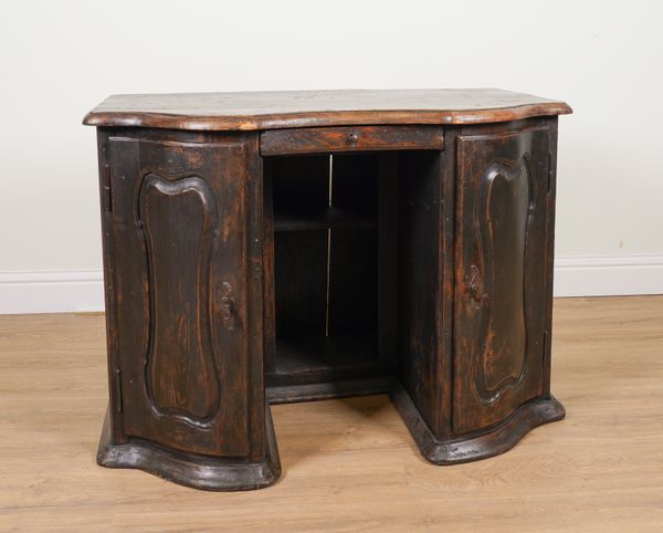 AN 18TH CENTURY CONTINENTAL STAINED PINE SERPENTINE TWO DOOR SIDE CABINET