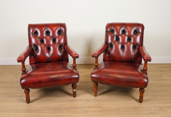 A PAIR OF ROUGE LEATHER UPHOLSTERED OPEN ARM EASY CHAIRS (2)