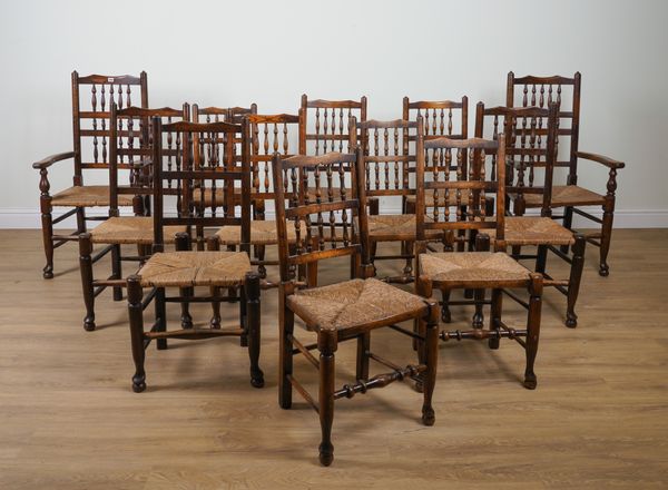 A MATCHED SET OF TWELVE LANCASHIRE RUSH SEAT BOBBIN BACK DINING CHAIRS (12)