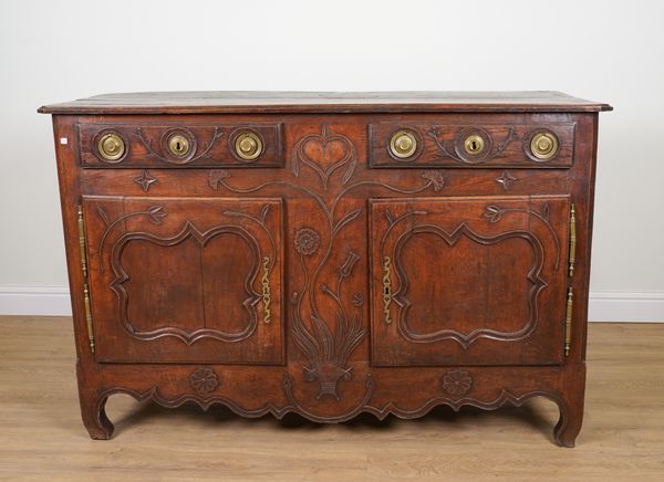 AN 18TH CENTURY FRENCH CARVED CHESTNUT BUFFET WITH PAIR OF DRAWERS OVER CUPBOARDS