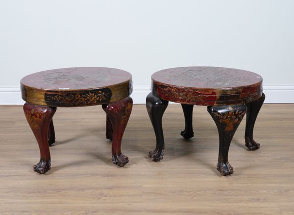 A PAIR OF EARLY 20TH CENTURY SCARLET LACQUERED CHINOISERIE DECORATED CIRCULAR OCCASIONAL TABLES ON BALL AND CLAW FEET (2)