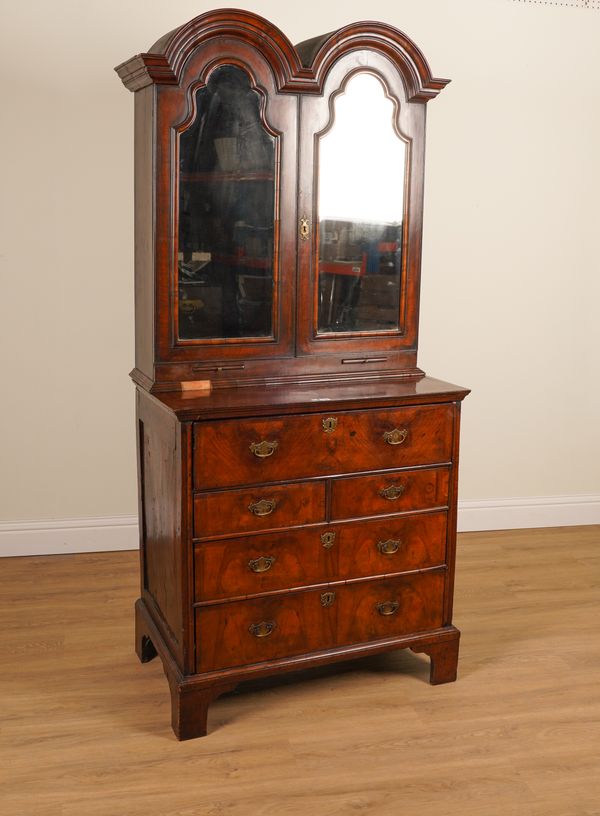 AN EARLY 18TH CENTURY FIGURED WALNUT SECRETAIRE CHEST OF DRAWERS