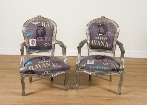 A PAIR OF LOUIS XV STYLE SILVER PAINTED OPEN ARMCHAIRS OR FAUTEUILS