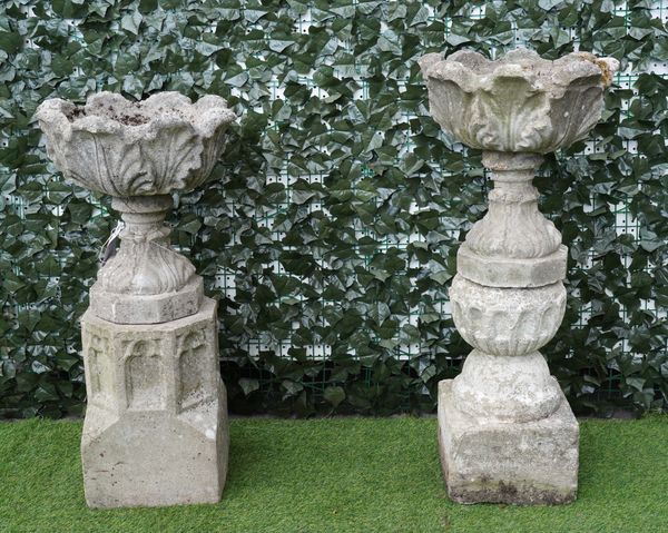 A PAIR OF LEAF MOULDED RECONSTITUTED  STONE GARDEN JARDINIERES ON ASSOCIATED BASES (2)