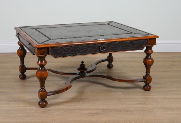 PROBABLY THEODORE ALEXANDER; AN EMBOSSED METAL VENEERED SINGLE DRAWER COFFEE TABLE