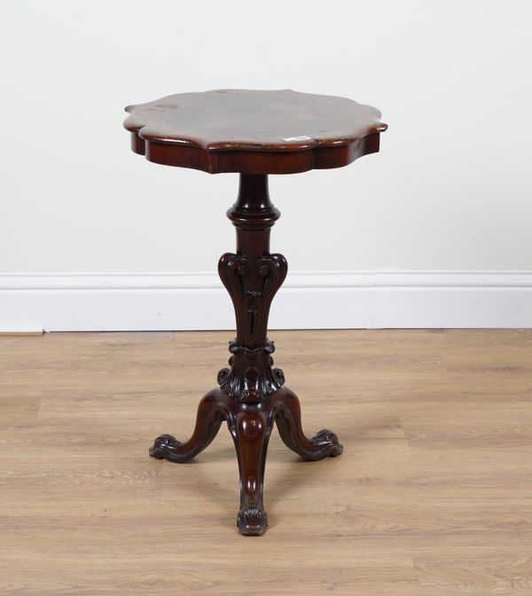 A VICTORIAN MAHOGANY SHAPED TOP OCCASIONAL TABLE ON CARVED TRIPOD BASE