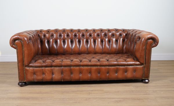 A BRASS STUDDED TAN LEATHER BUTTONBACK CHESTERFIELD SOFA