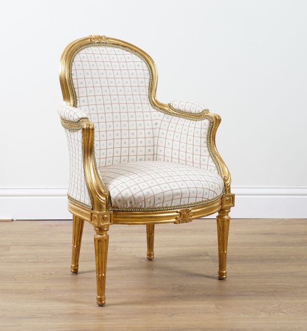 AN 18TH CENTURY FRENCH TRANSITIONAL STYLE GILT FRAMED TUB BACK SIDE CHAIR