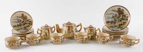 A JAPANESE SATSUMA-STYLE EARTHENWARE TEA SERVICE (24)