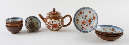 A CHINESE `BATAVIAN'  WARE TEAPOT AND COVER AND FOUR TEABOWLS AND SAUCERS (10)