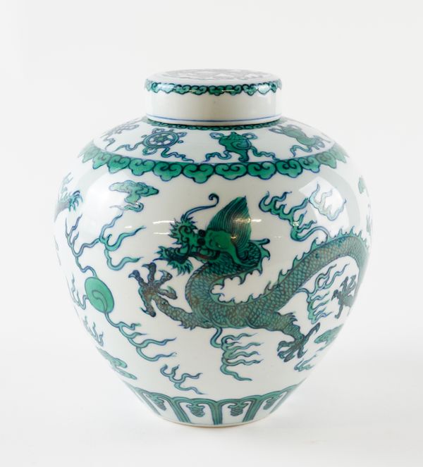 A CHINESE GREEN-ENAMELLED `DRAGON' JAR AND COVER (2)