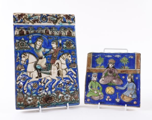 A QAJAR RECTANGULAR POTTERY TILE